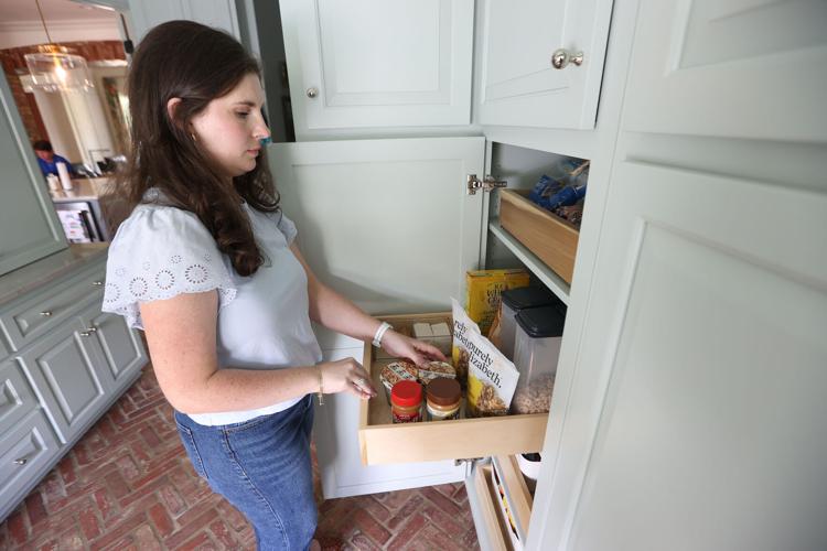 Amanda organizing a pantry pullout